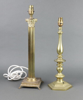 A brass table lamp with reeded column and Corinthian capital, raised on a square base 41cm h x 13cm x 13cm together with a brass table lamp on a hexagonal base 35cm h x 13cm 