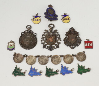 A silver sports fob, 2 others, minor charms and a bracelet 