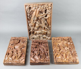 Four various deeply carved Eastern panels depicting figures 49cm h x 28cm x 4cm, 41cm x 21cm x 4cm, 39cm x 25cm x 4cm and 33cm x 19cm x 5cm  