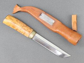A Finland skinning knife, the 14.5cm blade marked M7?? with wooden grip and leather and silver mounted scabbard 