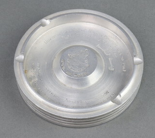 A Second World War ashtray formed from a piston from a Rolls Royce Merlin engine, the centre with RAF crest and Churchill quotation 2cm x 13.5cm diam. 