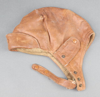 A 1930's Ledux leather motoring/flying helmet 