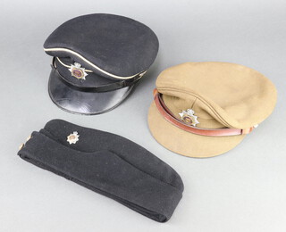 A Bates Elizabeth II Royal Army Service Corps Officer's peak cap, a Service Dress hat and a Field Service side cap 