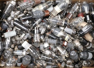 A collection of loose valves including Osram, Philco and others, contained in a green fruit box 