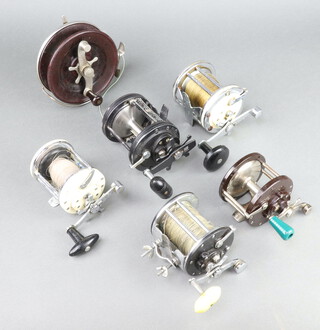 A Captain Mitchell 624 fishing reel, a Garcia Mitchell 600 reel, an Silstar NT37 reel, a Penn no.85 reel, a Penn 350 reel and an Alvey Snapper reel 