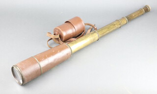 Dolland, a brass 4 draw telescope with leather case 
