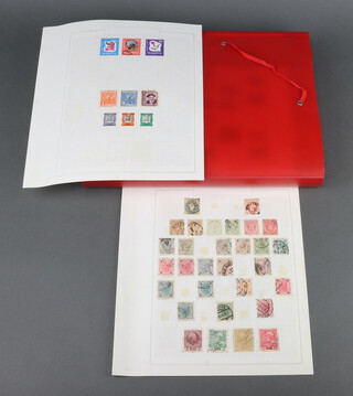 A quantity of loose album pages of mint and used world stamps including Spain, France, Denmark, Germany etc, in a red plastic folder  