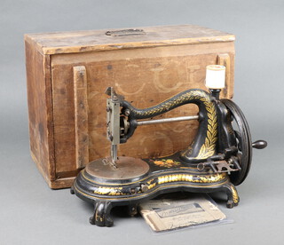 A Jones sewing machine marked Jones Hand Machine as supplied to the Princess of Wales, complete with instructions 