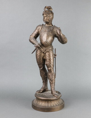 A 19th Century spelter figure of a standing warrior raised on a circular base 56cm x 16cm 