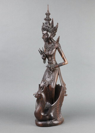 An Eastern carved hardwood figure of a standing lady 52cm x 13cm x 15cm 