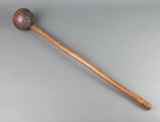 A 19th Century Polynesian throwing club, the head set studs 65cm 