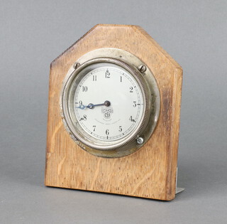 Smiths, an 8 day car clock, the dial marked P-34,198 with 7cm silvered dial, Arabic numerals, contained in an oak case 16cm x 5cm x 13cm 