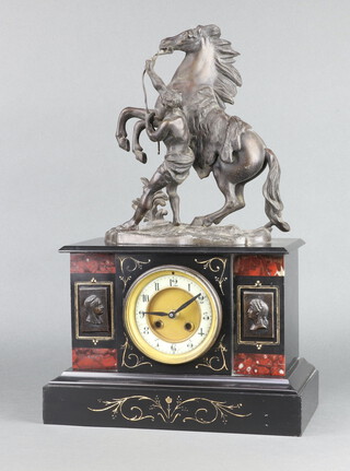 A 19th Century 2 colour marble architectural clock case with enamelled dial, Arabic numerals, surmounted by a figure of a marley horse, the movement has been replaced by a quartz movement, the handles have also been replaced, 50cm h x 30cm w x 16cm d 
