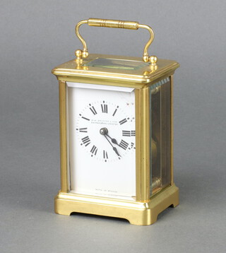 A 19th Century French 8 day carriage clock the 9cm x 5cm dial with Roman numerals and marked W M Burford and Sons, Eastbourne and Exeter, Made in France, contained in a gilt case 11cm x 8cm w x 6cm d 