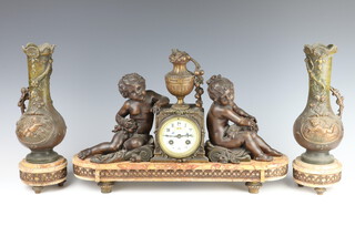 A 19th Century French clock garniture, the 8 day clock with enamelled dial, Arabic numerals, the back plate marked France JS, contained in a spelter case surmounted by a lidded urn supported by 2 seated cherubs 32cm x 50cm w x 14cm d, complete with pendulum (no key), together with a pair of club shaped vases 33cm x 10cm, all raised on a pink veined marble base 