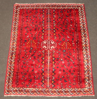 A red, blue and orange ground Afghan rug with all over geometric design of animals and birds 201cm x 163cm  