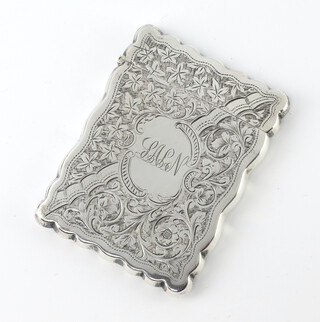 An Edwardian silver card case with engraved scroll decoration and monogram Birmingham 1901, 58 grams, 9.5cm 