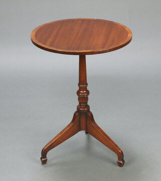 A circular inlaid and crossbanded mahogany wine table, raised on pillar and tripod base 57cm h x 42cm diam. 