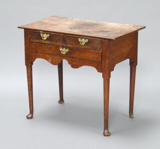 A 17th/18th Century oak side table/low boy fitted 3 drawers, raised on club supports 71cm h x 81cm w x 48cm d 