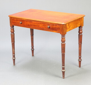 A Victorian mahogany side table fitted a frieze drawer, raised on turned supports 76cm h x 93cm w x 53cm d 