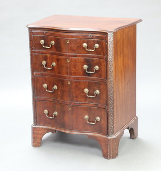 A mahogany Georgian style serpentine fronted chest with brushing slide above 4 long drawers, having blind fretwork canted corners, raised on bracket feet 89cm h x 67cm w x 50cm d 