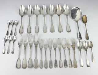 A canteen of Continental white metal cutlery comprising 6 coffee spoons, 2 dessert spoons, a serving spoon, 8 dessert forks, 4 dinner forks, 7 table spoons, 1460 grams  