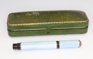 A white metal guilloche enamel propelling pencil (bruised) in a fitted case 9cm 