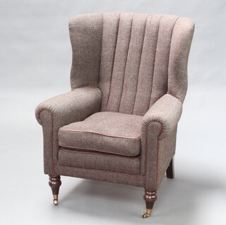 A Wesley Barrell Victorian style tub back armchair upholstered in Harris Tweed material raised on turned supports 104cm h x 80cm w x 74cm d 