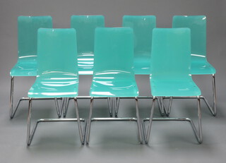 A set of 7 stylish chrome and moulded turquoise plastic cantilever chairs 90cm h x 40cm w x 36cm d 