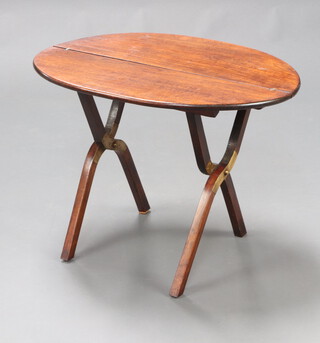 A 19th/20th Century oak oval folding coaching table with metal mounts 54cm h x 73cm w x 58cm d 