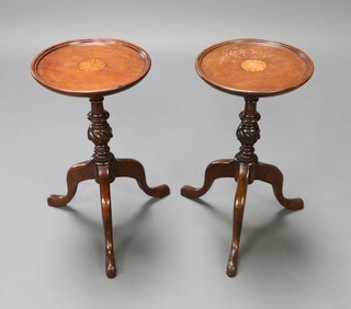 A pair of circular Edwardian inlaid mahogany wine tables raised on pillar and tripod bases 45cm h x 23cm diam. 