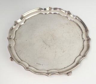 A silver card tray with Chippendale rim and engraved monogram Sheffield 1914, 20cm, 349 grams 