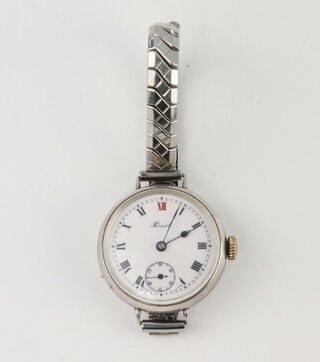 A gentleman's 925 standard mechanical wristwatch with red 12 and seconds at 6 o'clock, the dial inscribed Reid, the reverse engraved ACS Stephen 1916, contained in a 30mm case on an expanding chrome bracelet 