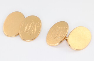 A pair of 18ct yellow gold oval cufflinks with engraved monogram 12.6 grams 
