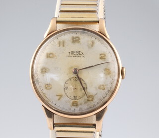 A gentleman's 9ct yellow gold Trebex wristwatch with seconds at 6 o'clock, contained in a 33mm case on an expanding gilt bracelet with engraved presentation on the back 