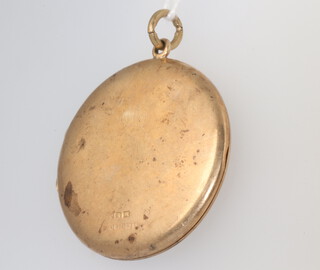 A circular 9ct yellow gold locket, gross weight 13.4 grams, 4cm 