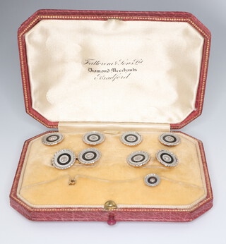 A set of yellow metal 18ct diamond, mother of pearl and black onyx studs comprising 4 studs, pair of cufflinks, 1 odd stud and a stud base, contained in a fitted box 