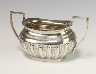 An Edwardian silver demi-fluted 2 handled sugar bowl bearing engraved monogram, Birmingham 1906, 213 grams 