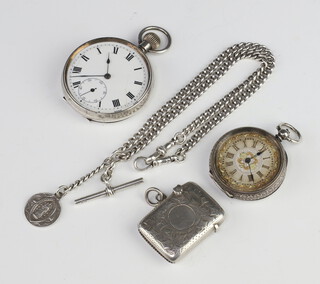 A lady's Continental white metal fob watch with champagne dial, a gentleman's silver mechanical pocket watch, a ditto Albert and a vesta, weighable silver 49 grams 