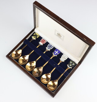 A set of 6 limited edition silver gilt and enamelled spoons Birmingham 1980, in commemoration of The Queen Mother's 80th birthday no.74 of 2000, 182 grams, boxed