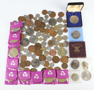A collection of world and other coins and crowns 