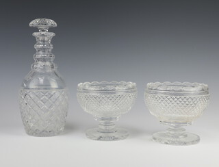 A pair of 19th Century circular cut glass pedestal bowls raised on spreading feet 12cm x 13cm together with a cut glass ring neck decanter and stopper 25cm  