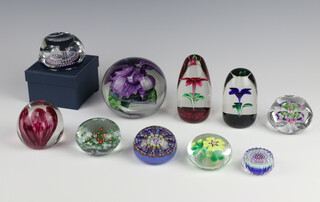 A Drew Ebelhare circular paperweight base marked 4/04 5cm diam., a Selkirk Limited Edition ditto base marked SG110/500 2000, Strathearn ditto 6cm x 5cm, a Sidney Long ditto with floral decoration 9cm x 8cm, a Whitefriars hexagonal ditto 6cm x 7cm boxed and 4 other paperweights