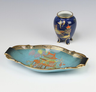 A Carlton Ware blue ground ovoid vase decorated with Chinese landscape 10cm, ditto turquoise ground dish decorated with a pagoda Bleu Royale 26cm and a ditto blue ground shallow bowl decorated with pagoda view with animals and figures 2882 32cm 