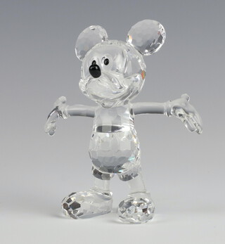 A Swarovski Crystal Disney Showcase figure of a standing Mickey Mouse 10cm  boxed and with certificate 
