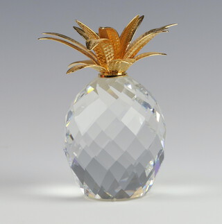 A Swarovski Crystal glass and gilt paperweight in the form of a pineapple 10cm, boxed (no certificate) 
