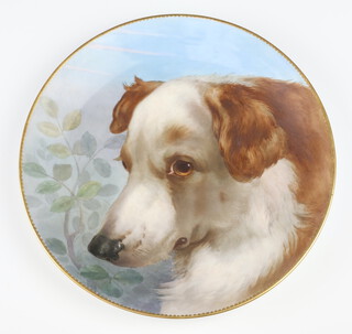 A Victorian circular Minton plate decorated a dogs head, reverse impressed Minton mark and triangle within a circle 24cm 