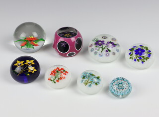 An Andy Scott Fire Flower paperweight, a Peter McDougall double overlay Garland Bouquet paperweight, 3 Peter McDougall limited edition paperweights - Collection 2006 no.10, Collection 2007 no.3 and Collection 2009 no.23, together with 3 others all with PMCD Glass Studio labels  