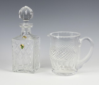 A Waterford Crystal Colleen pattern jug 15cm and a Waterford Crystal Nocturne pattern spirit decanter and stopper 