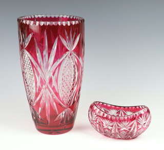 A red overlay cut glass vase 31cm together with a boat shaped vase 8cm x 15cm x 8cm 